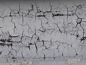 千代田区神田神保町で剥がれてきたバルコニーの床を調査